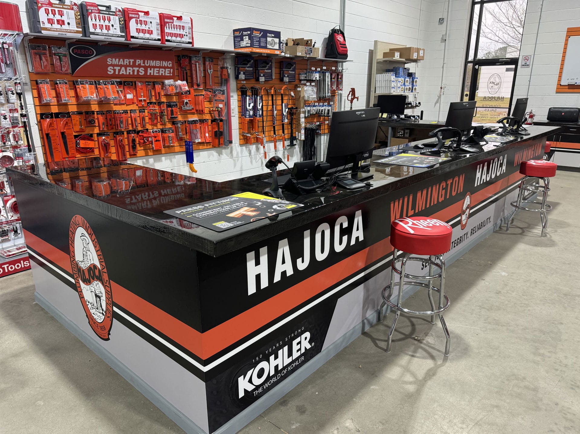 Hajoca Wilmington NC Wholesale Plumbing Supply House front counter with stool